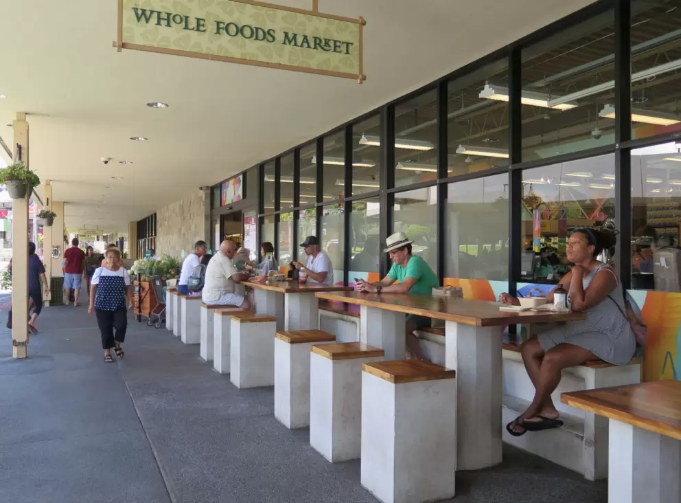 Seating outside Whole Foods Market.