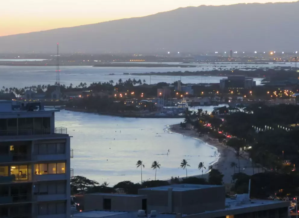 Dusk at Ala Moana Beach Park, as seen from Kalia Tower in the Hilton Hawaiian Village.