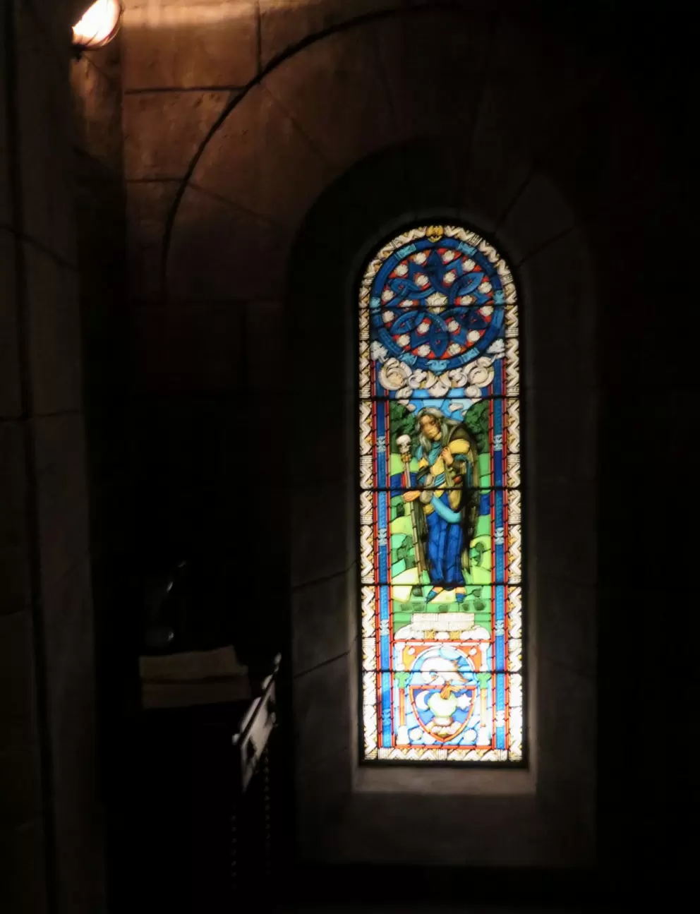 Stained glass in the waiting area for the Harry Potter and the Forbidden Journey ride.