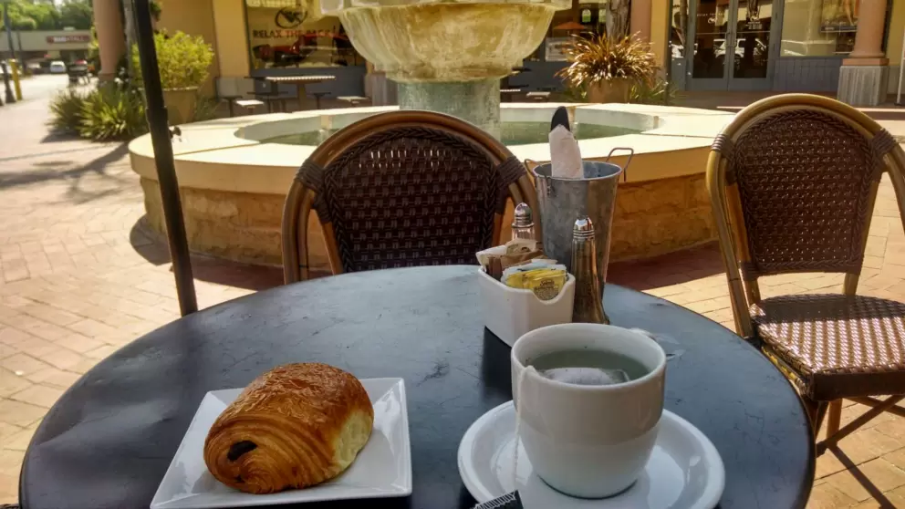 Pain au chocolat and tea, outside at Renaud's. 