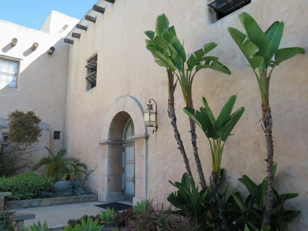 Banana trees near a side door.