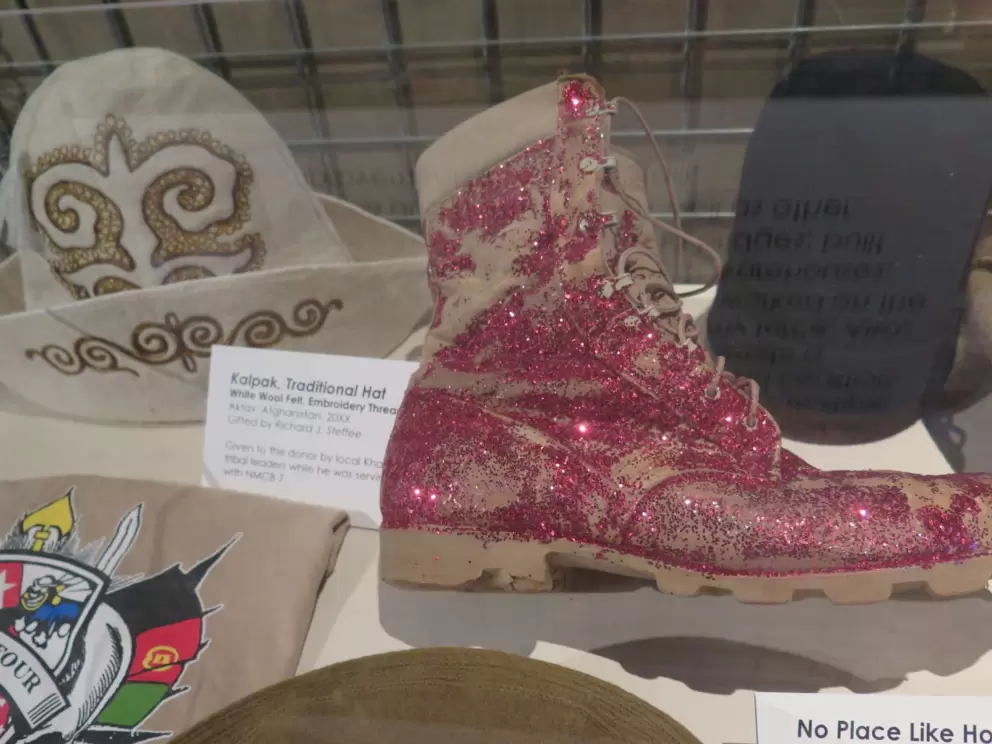 Red glittered desert boots, sent to Chief Pierce by SW1 English in the last care package before returning home.