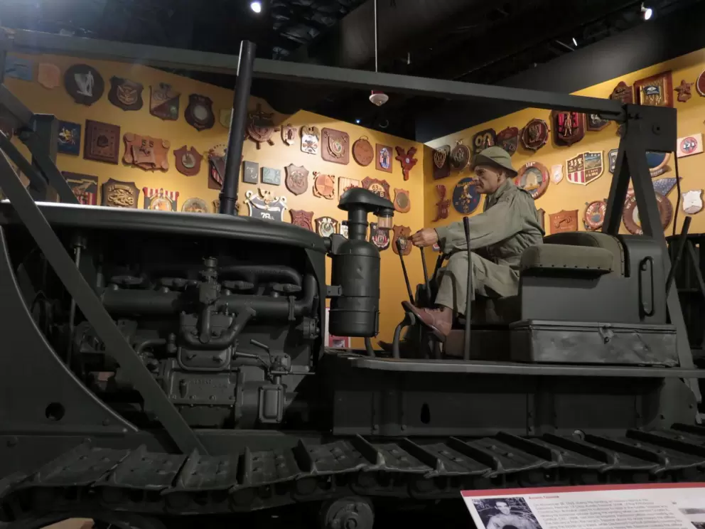 Aurelio Tassone, of the 97th Naval Construction Battalion, used his bulldozer in the Solomon Islands to help in the battle against the Japanese.