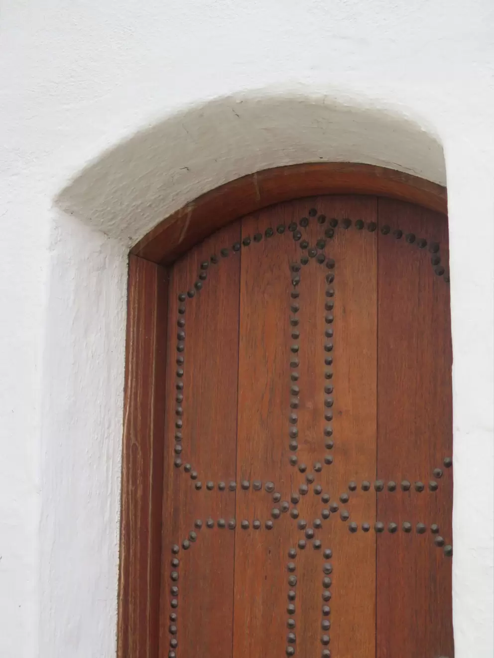 Side doorway with decoration.