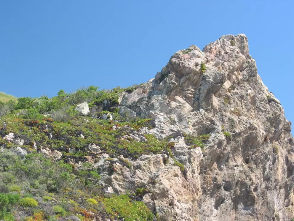 The familiar rock you always see from the freeway is right by you!