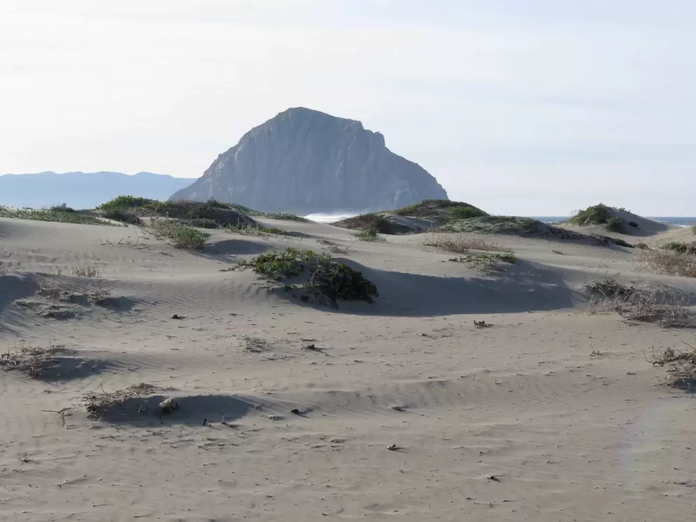 Morro Rock, past the dunes.