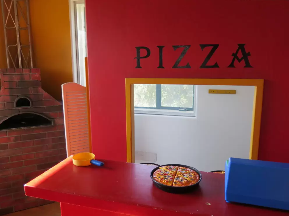 Cook a pizza! Then serve it to your parents!