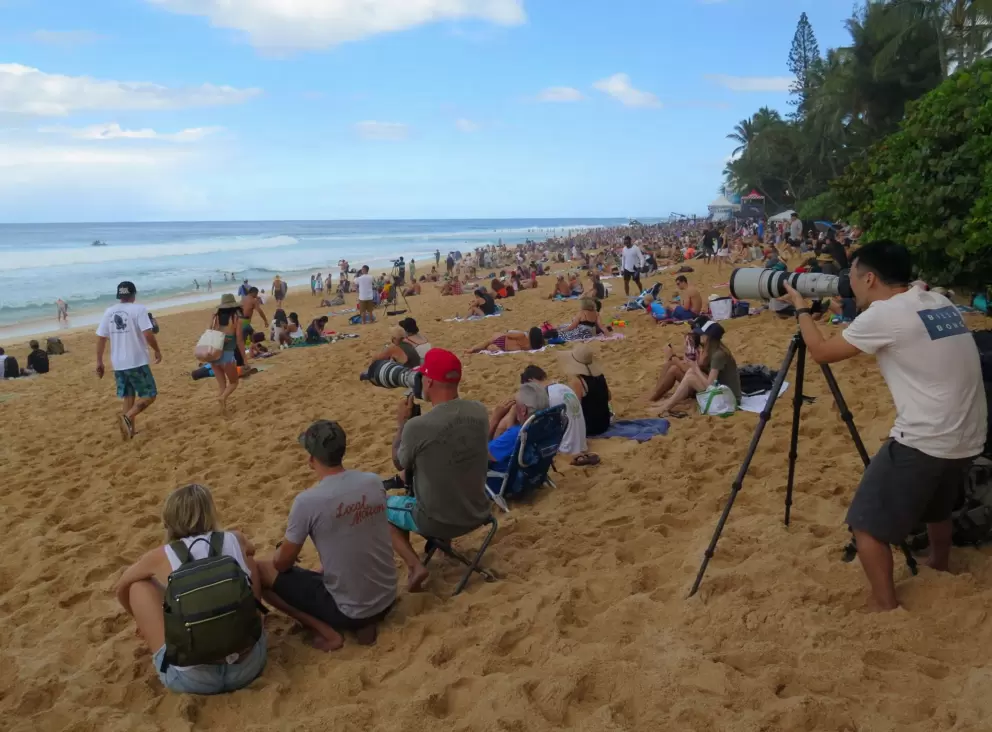 Photographer catching the rides at the Pipeline Masters.