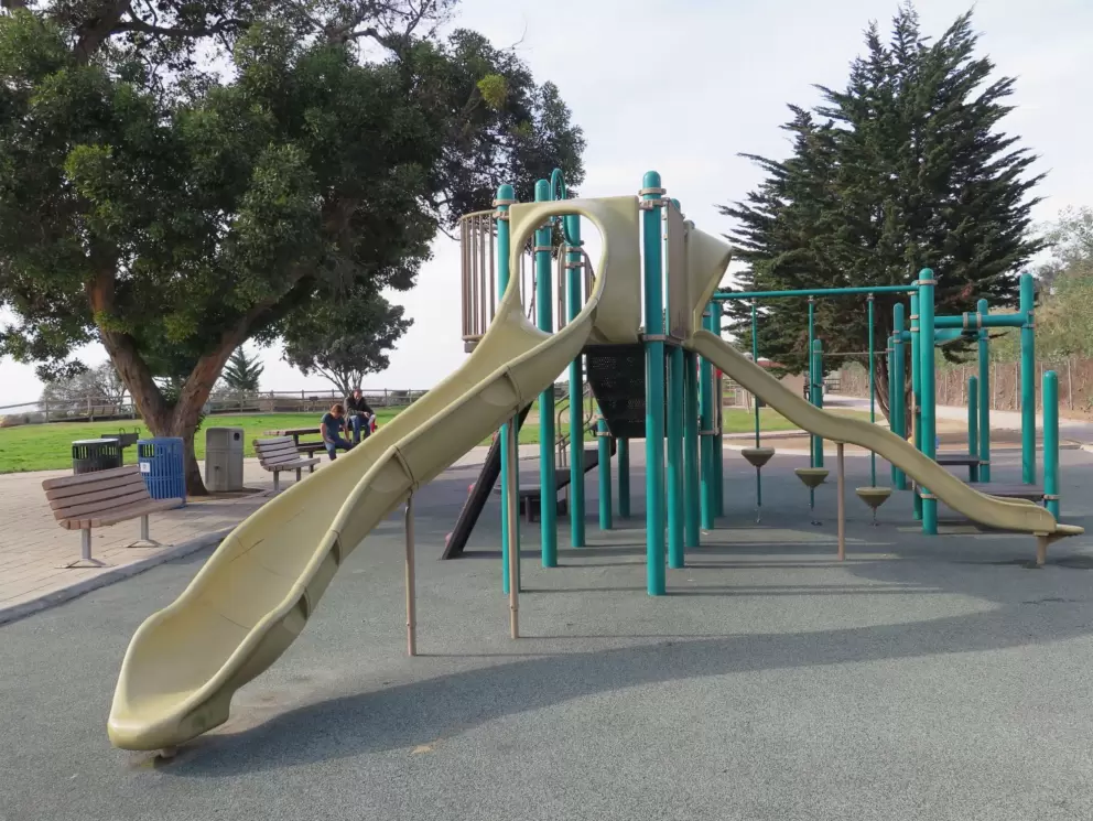 The play structure and nice trees.
