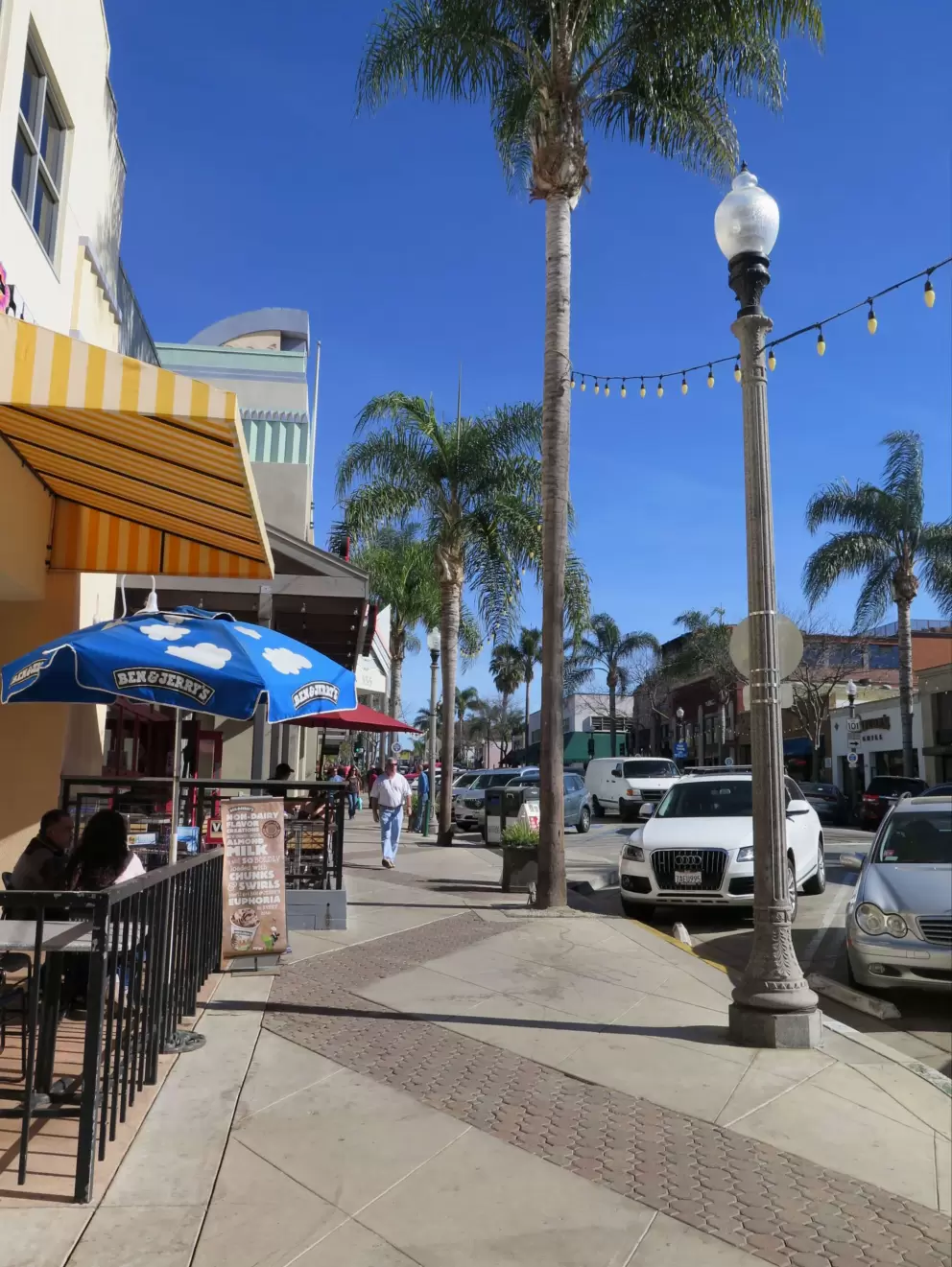 Main street on a sunny day. Ben and Jerry's Ice Cream no longer exists. 