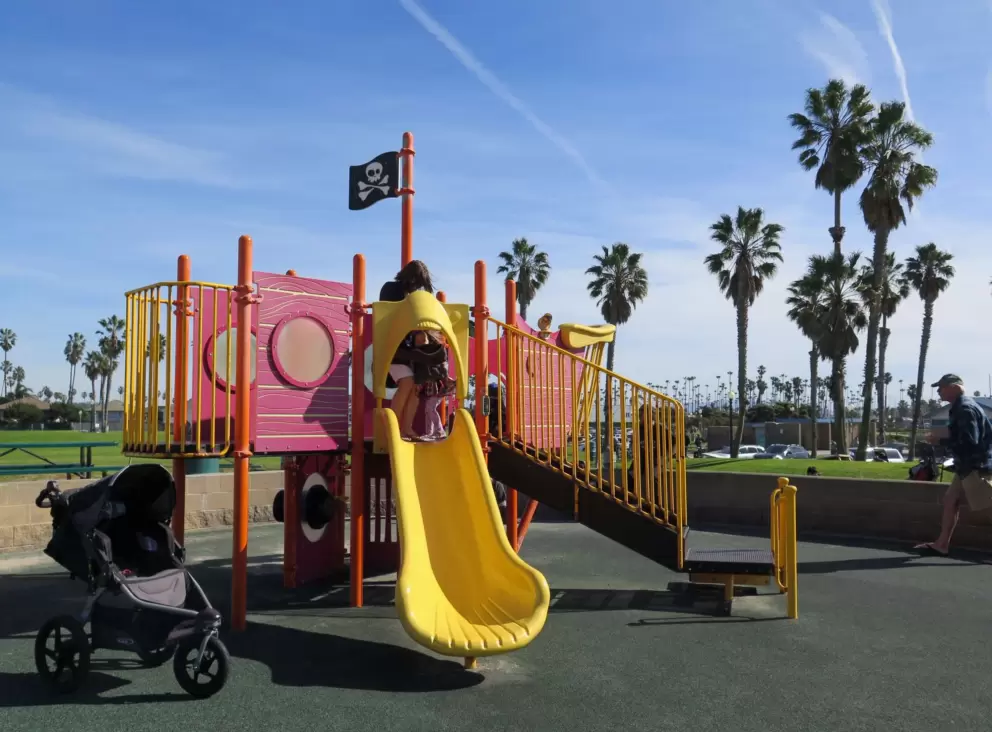 Pirate playground with yellow slide.