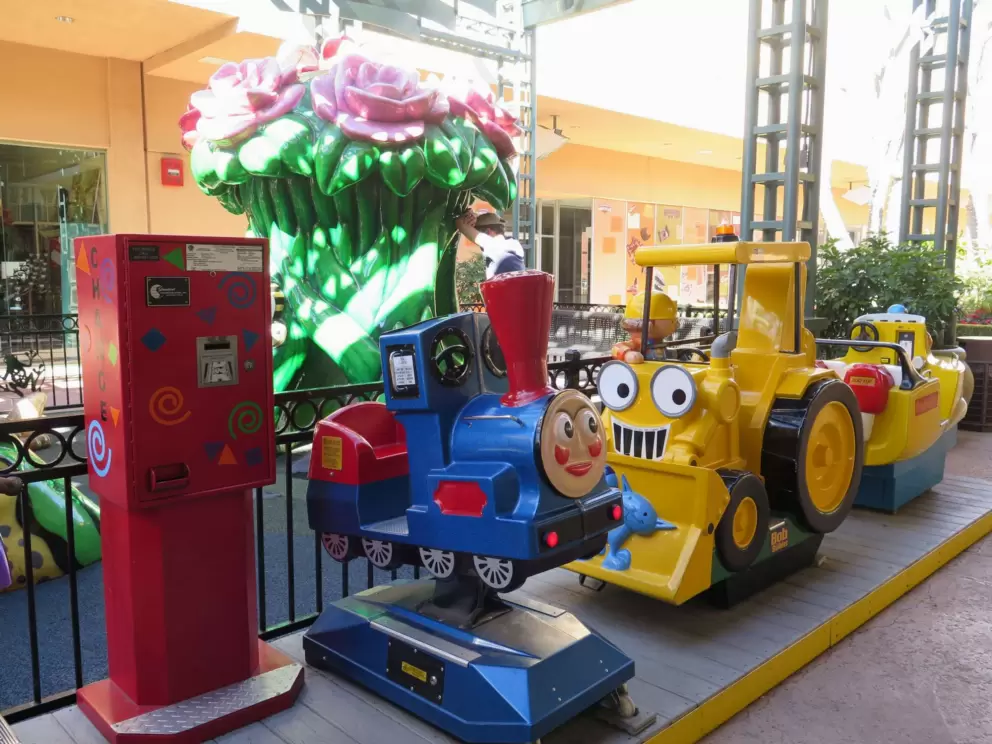 Train, boat, and tractor for toddlers to ride.