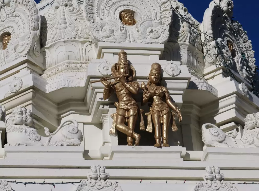 Golden statues atop the tower.
