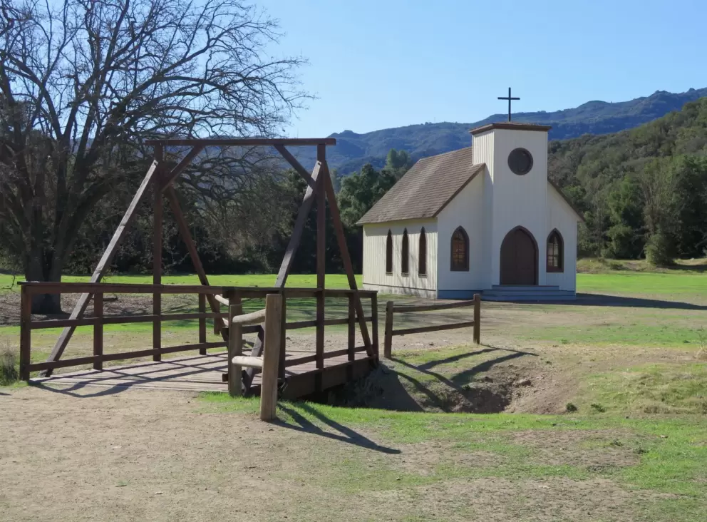Pedestrian bridge and church.