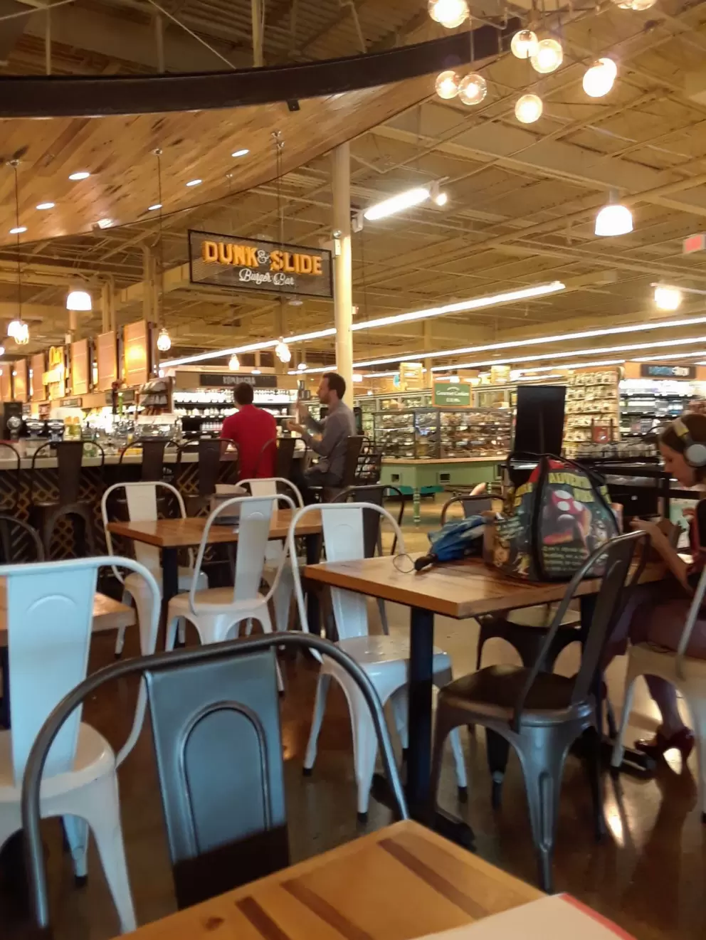 There's plenty of seating (seats are very hard though) inside Whole Foods.
