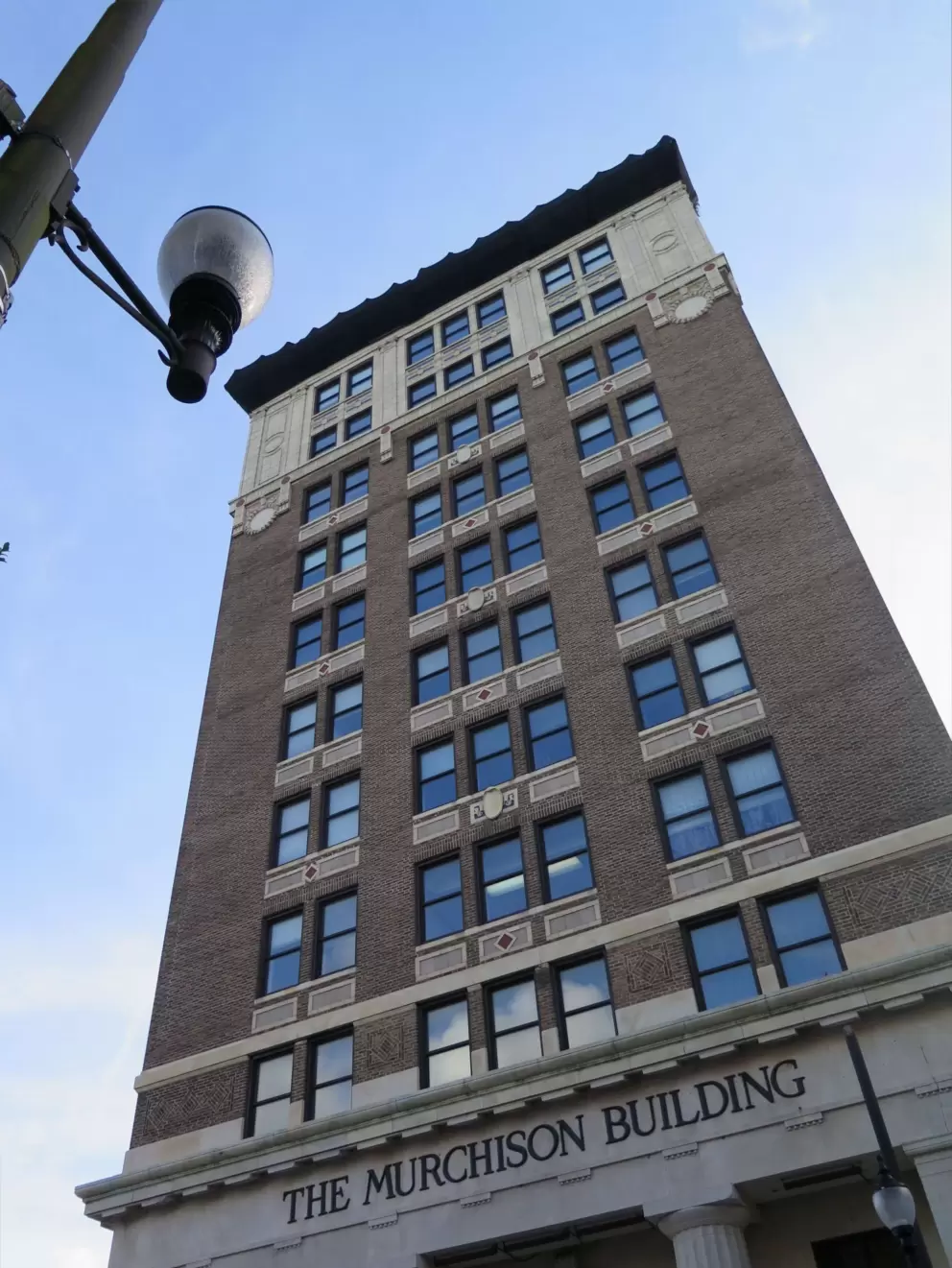 The Murchinson Building stretches up to the sky.