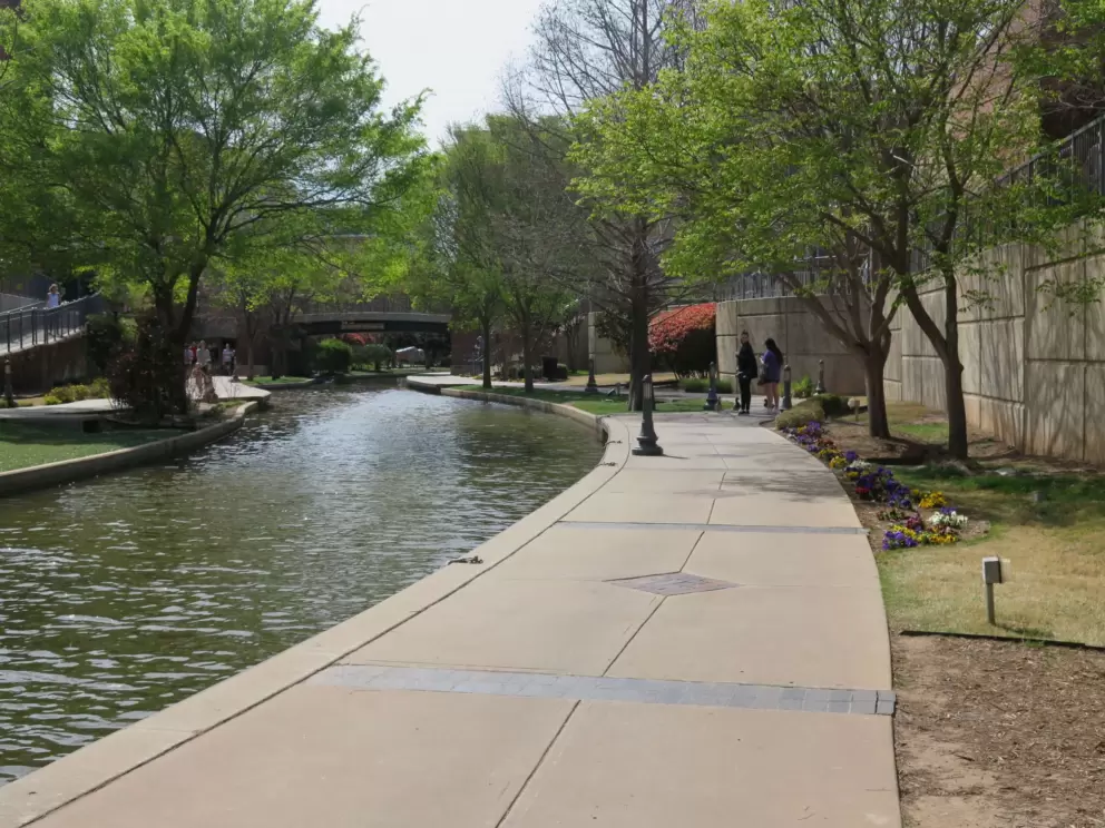 The wide walkway along the canal.