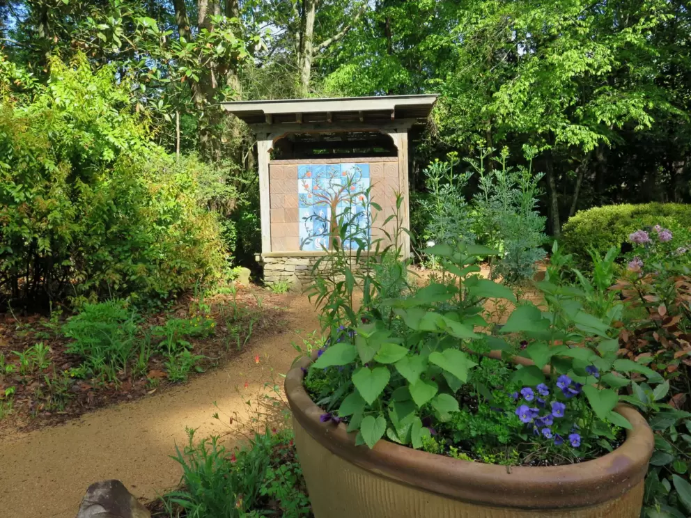 Artwork and potted plants.
