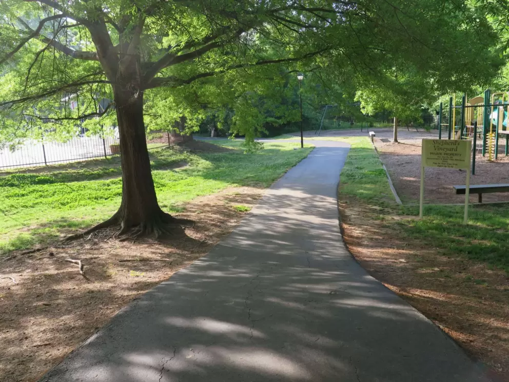 Path past the tennis courts, across Carriage Ridge Way from the greenway.