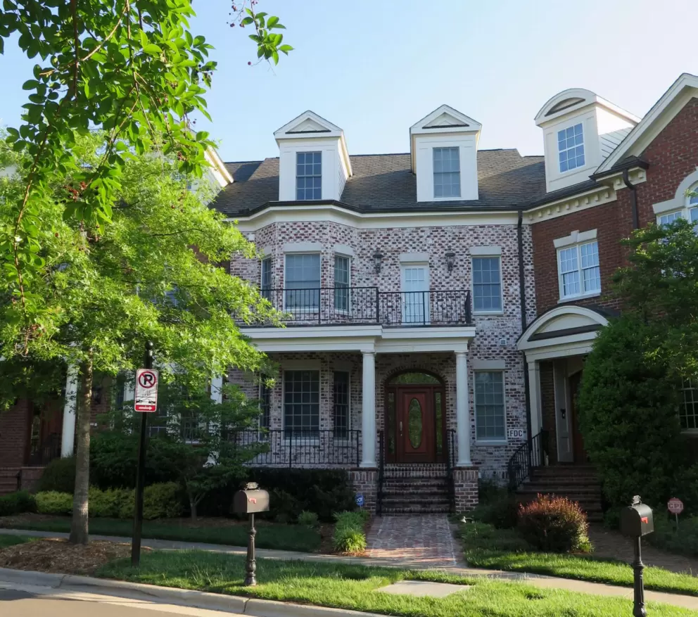 Speckled brick townhome on Oak Park Lane.