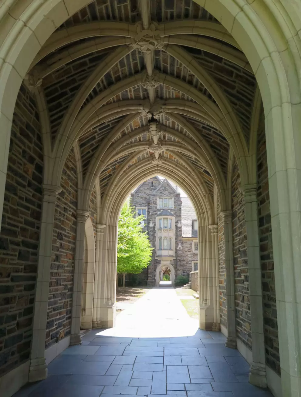 Walking under an archway.