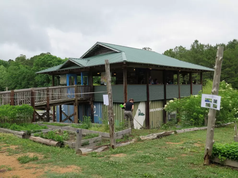 The farm with vegetable beds.