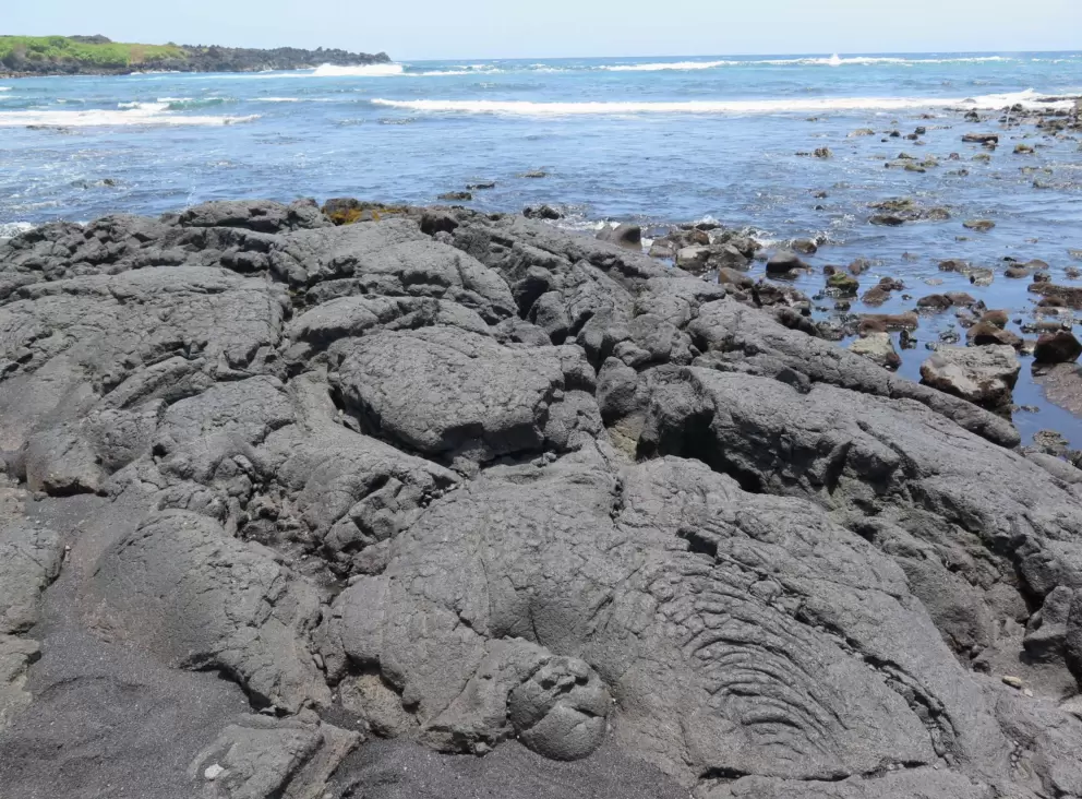 Lava rock and ocean.