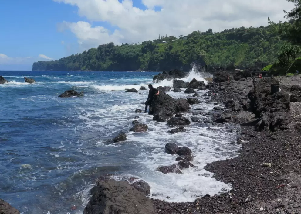 Beautiful headland and water rushing up to shore.