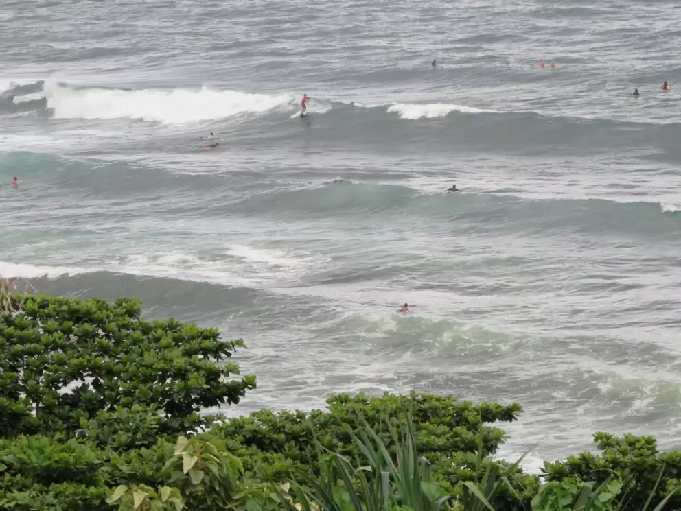 Surfer catching a wave.