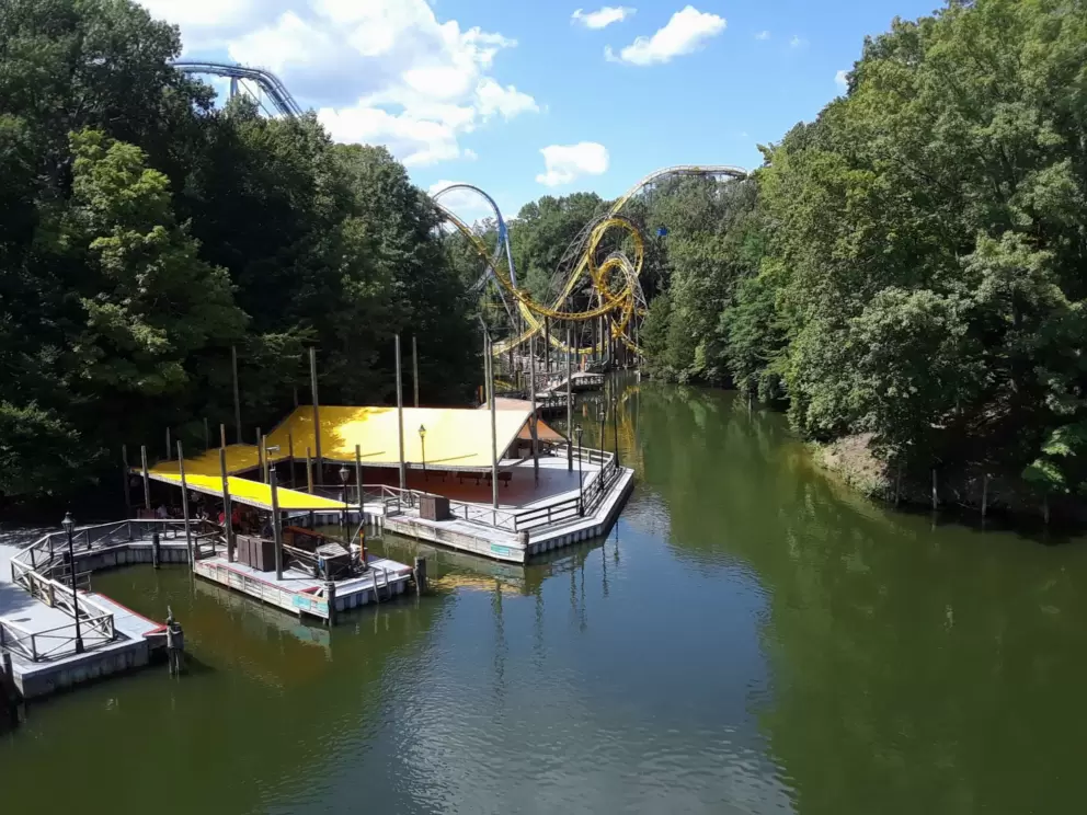 Water and Loch Ness Monster roller coaster in the distance.