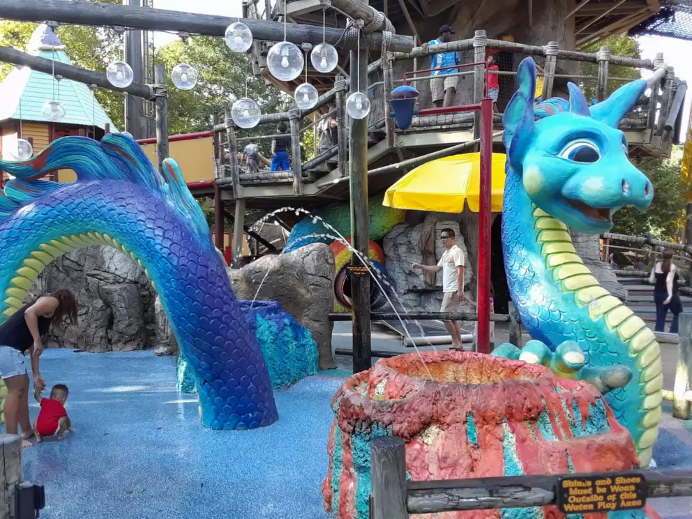 Sea monster splash pad in Land of the Dragons play area.