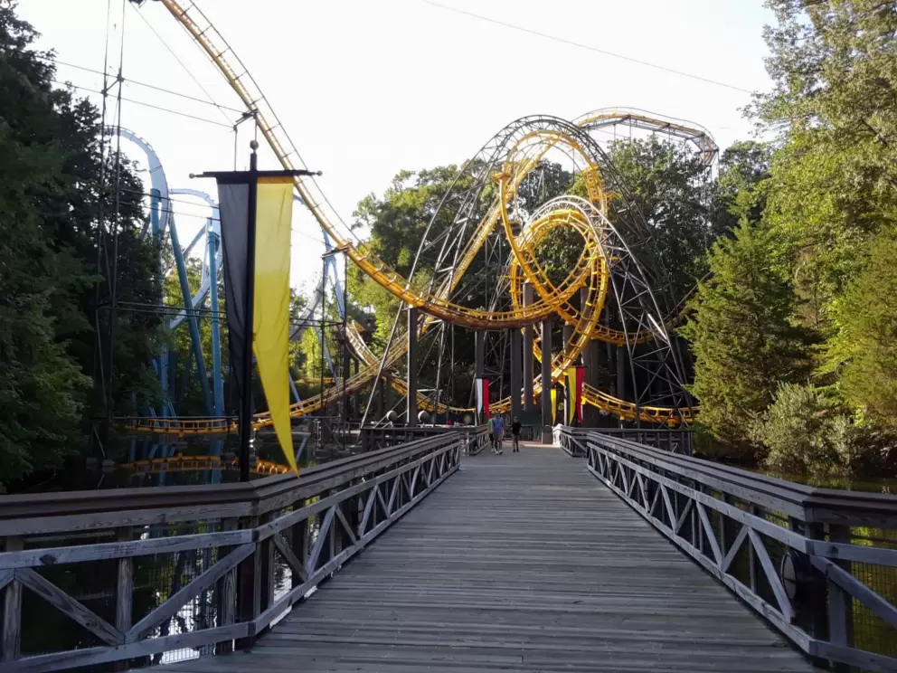 Walking the boardwalk where Loch Ness Monster roller coaster is ahead of you.
