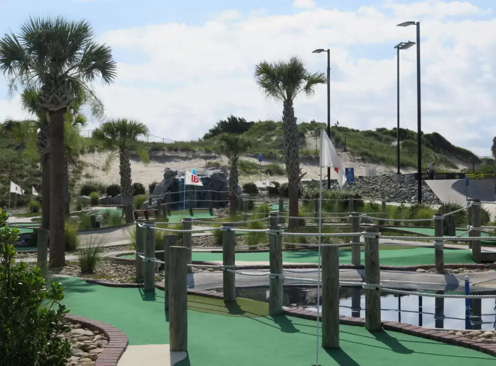 Dunes, palms, and mini golf.
