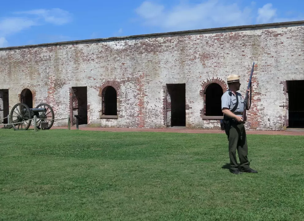 Humorous ranger teaching us about a rifle.