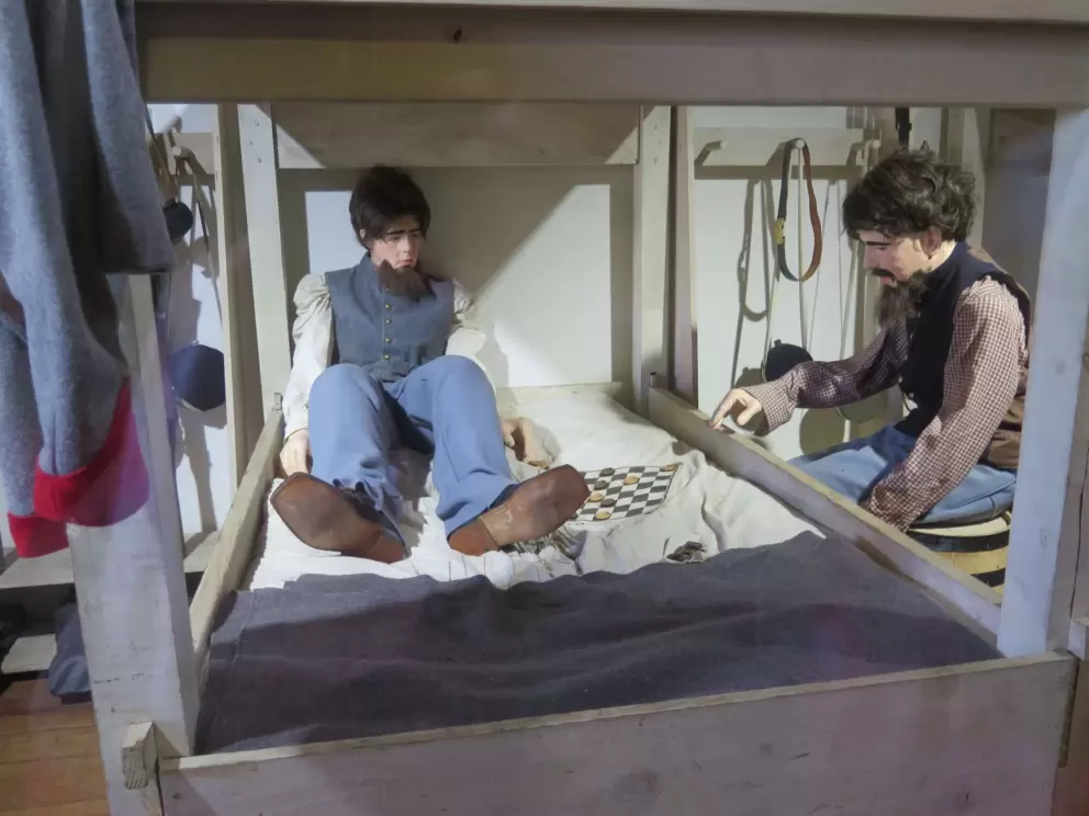 Lifesize scene of soldiers' lives in the fort.