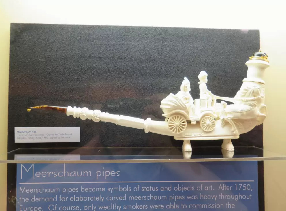 Meerschaum pipe. "Family on carriage ride." Turkey, 1980.
