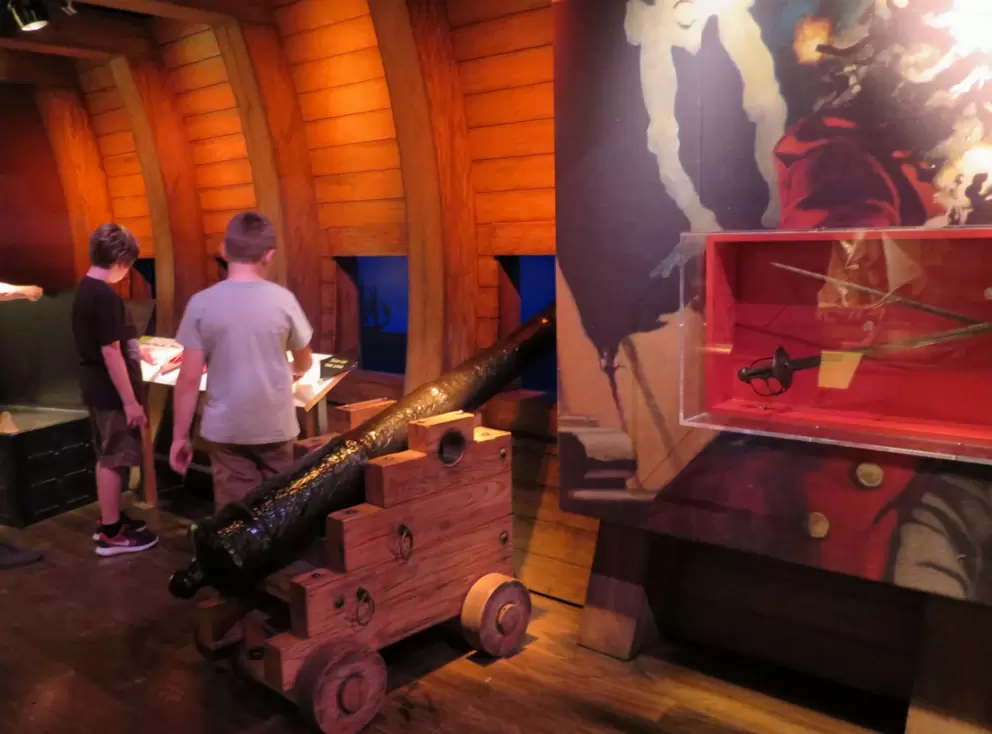 Boys checking out the pirate exhibit.