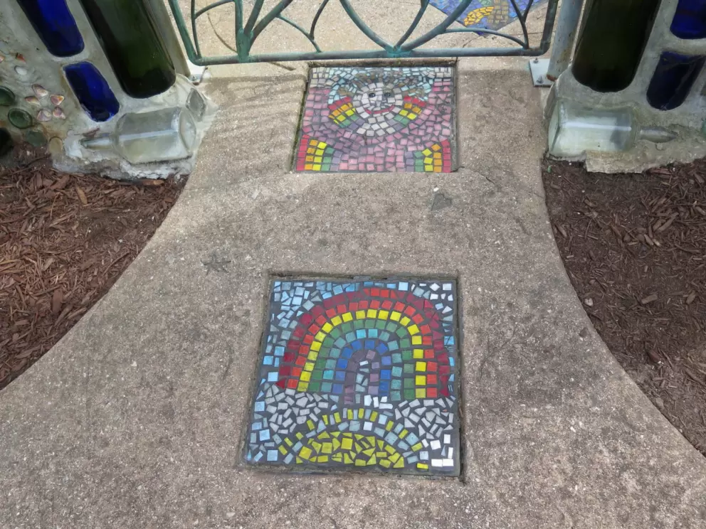 Rainbow mosaic on the ground.