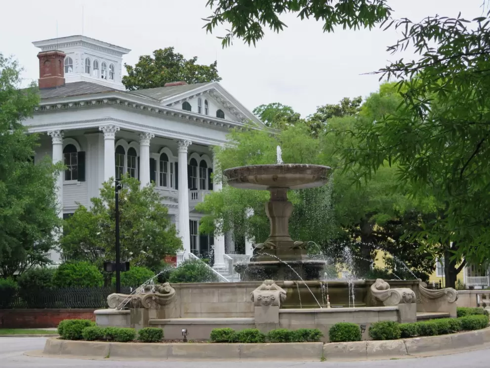 Fountain and mansion.