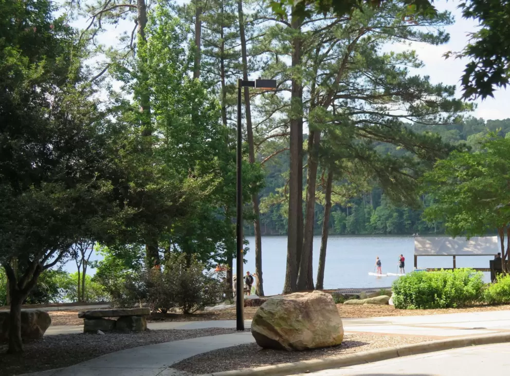 Small boulder, and SUPs in the distance.
