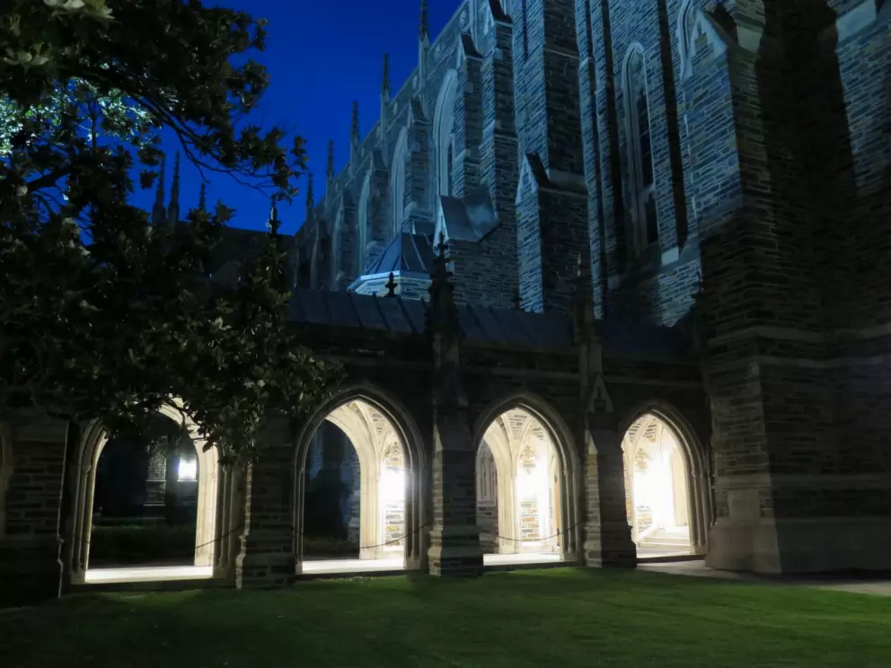 Arches lit at night.
