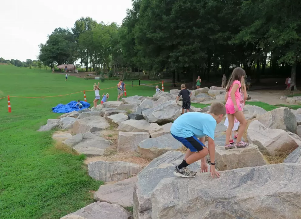 Kids love to climb these boulders behind the stage.