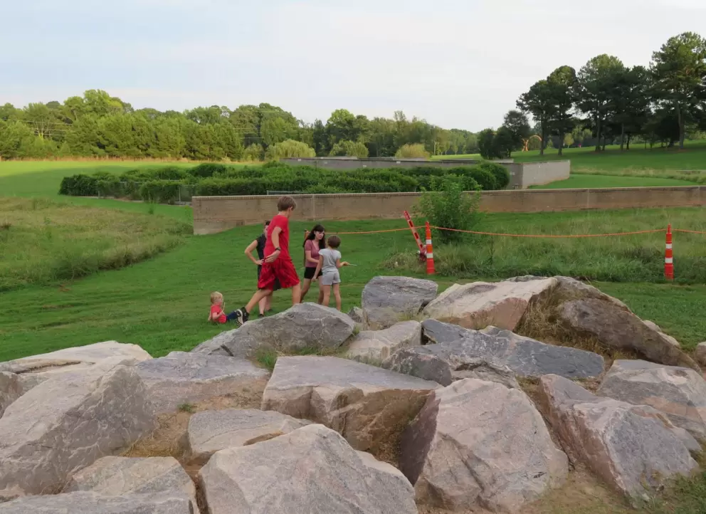 Boulders and grassy hills to explore.