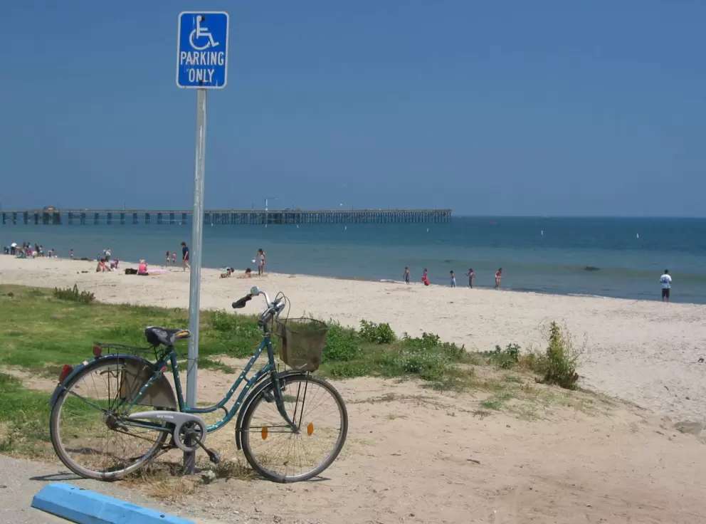 Taking a break from bikeriding to enjoy Goleta Beach!