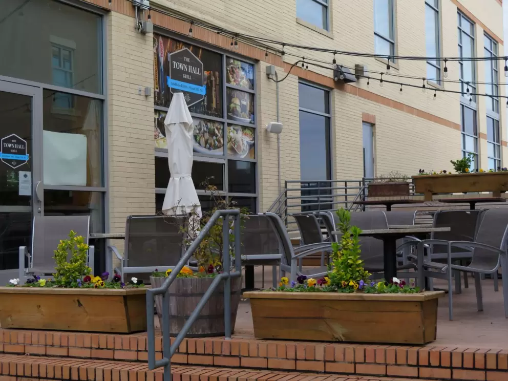Seating outside The Town Hall Grill.