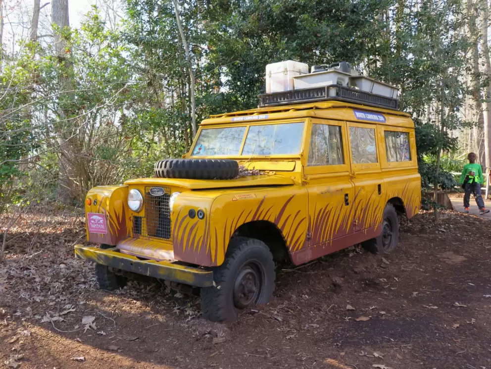 Muddy safari jeep sculpture.