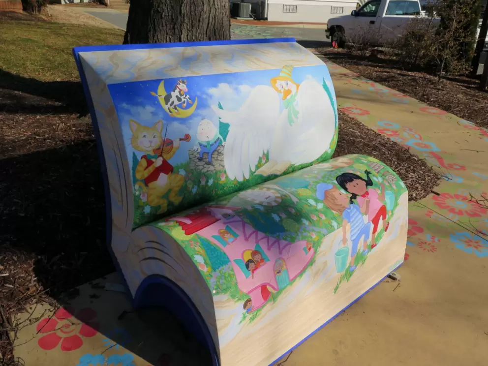 Nursery rhyme bench. I love nursery rhymes!