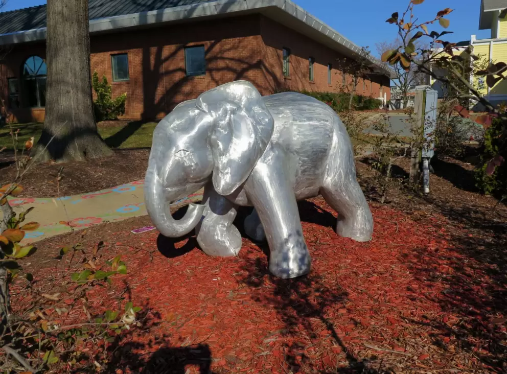 Silver elephant sculpture.