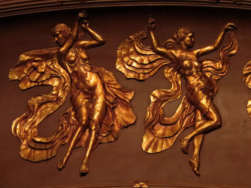 Muses above the stage in Carolina Theater.