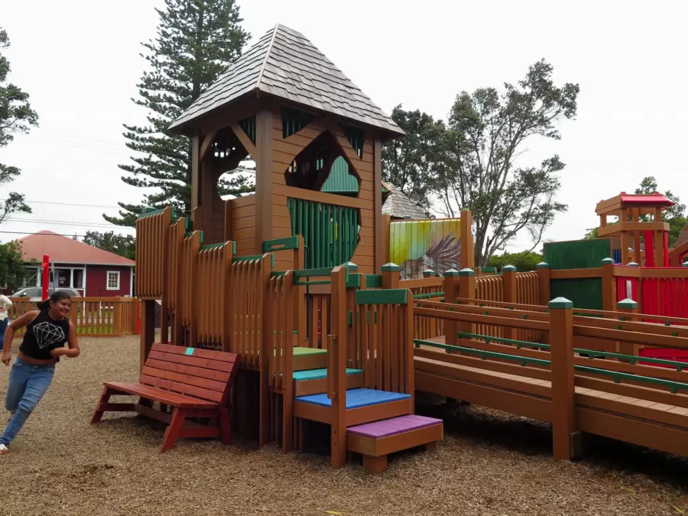 Running around the wooden playground.